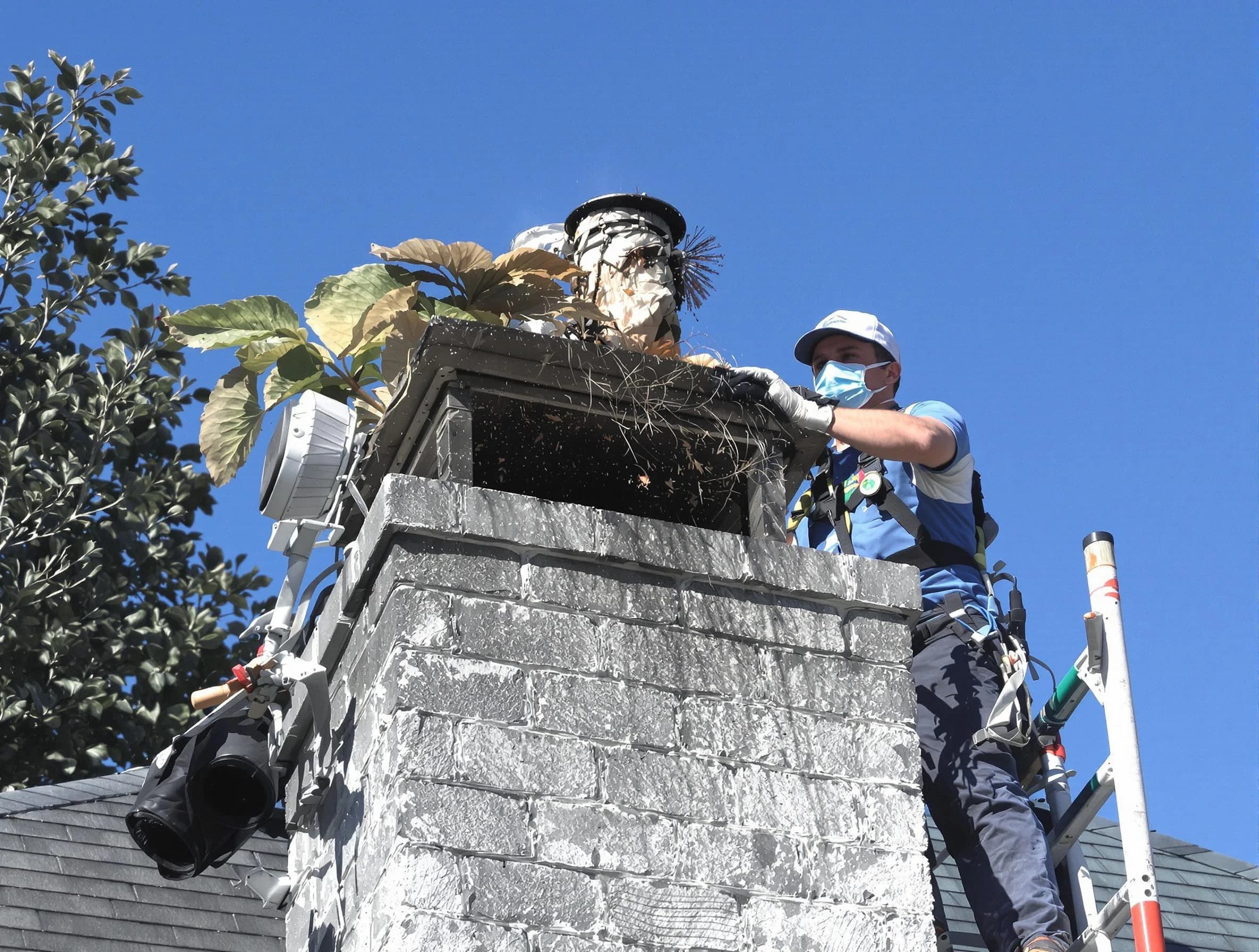 Manchester Chimney Sweep specialist performing chimney cleaning in Manchester, NJ